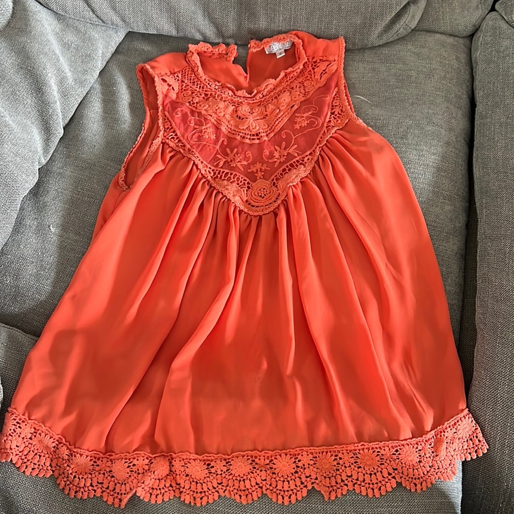 Flowy orange top woth lace detail